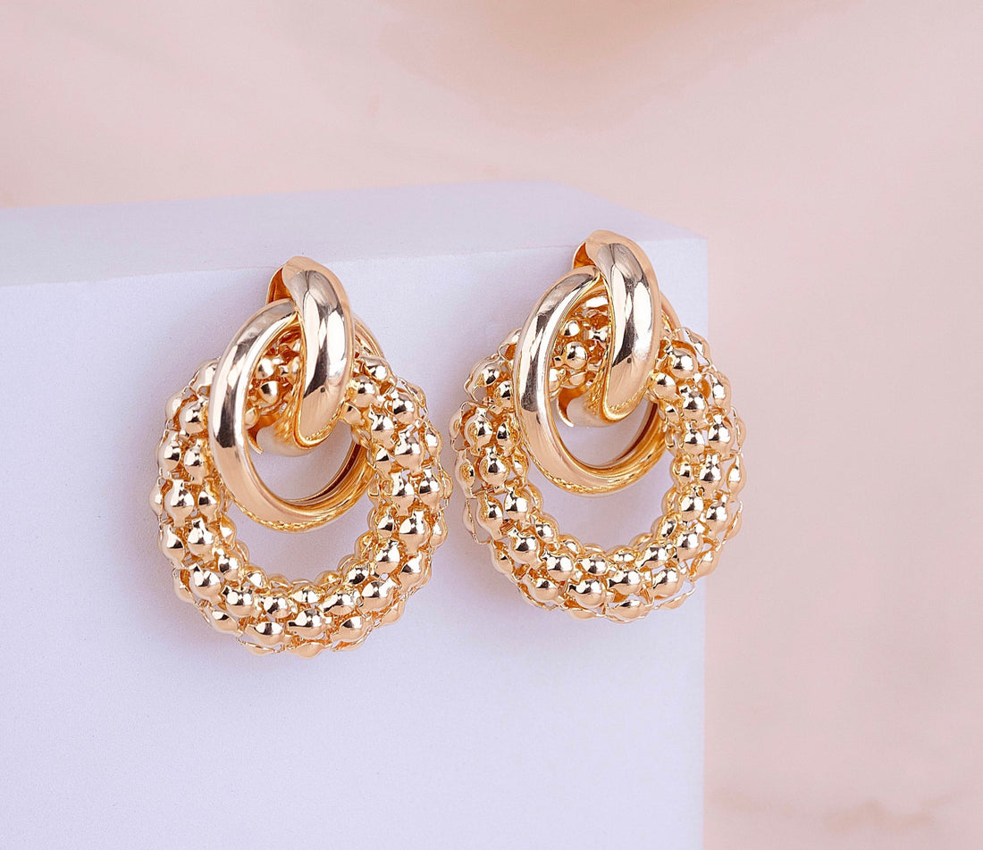 Aretes Círculos Cruzados Dorados Ref: B530