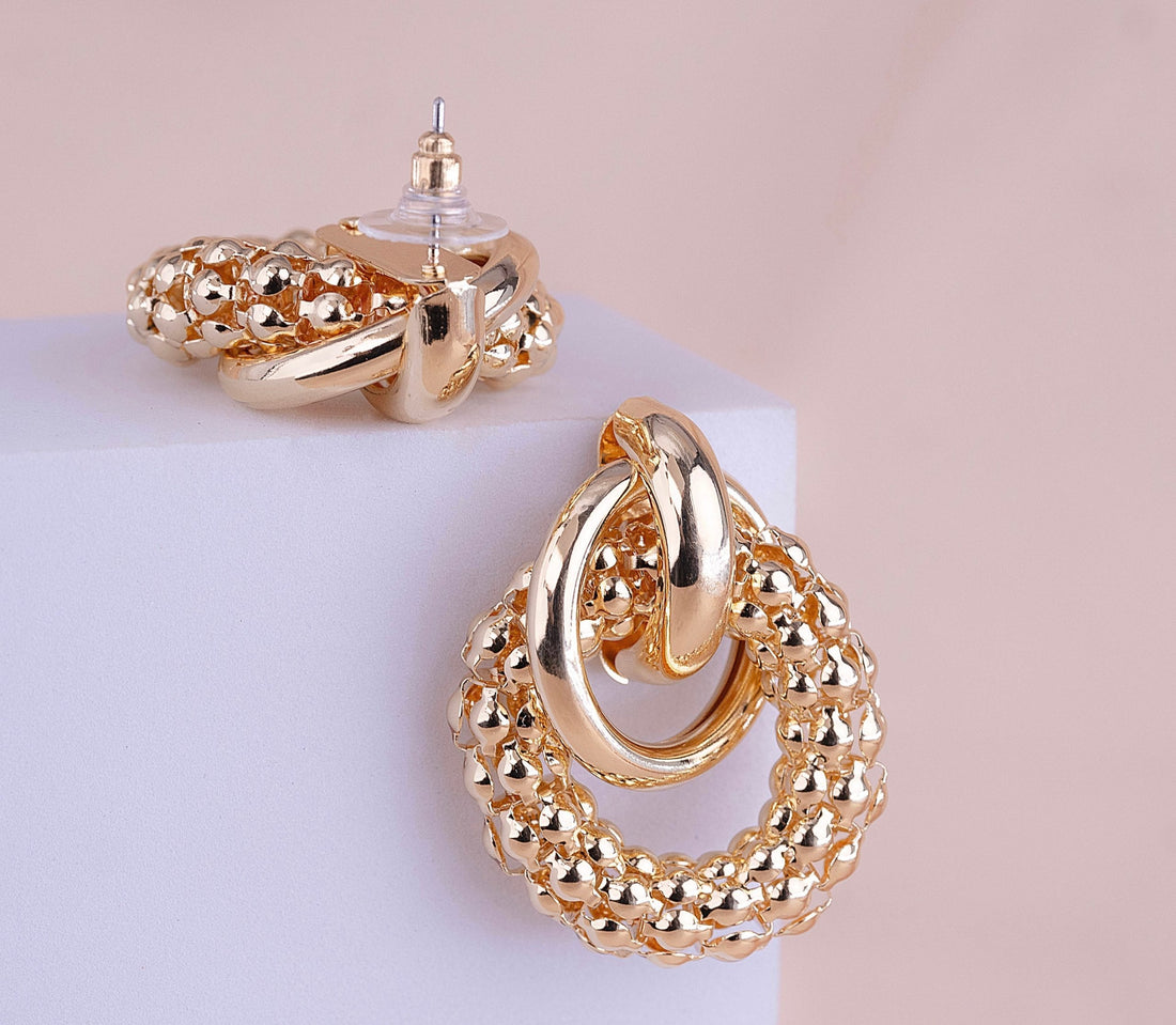 Aretes Círculos Cruzados Dorados Ref: B530