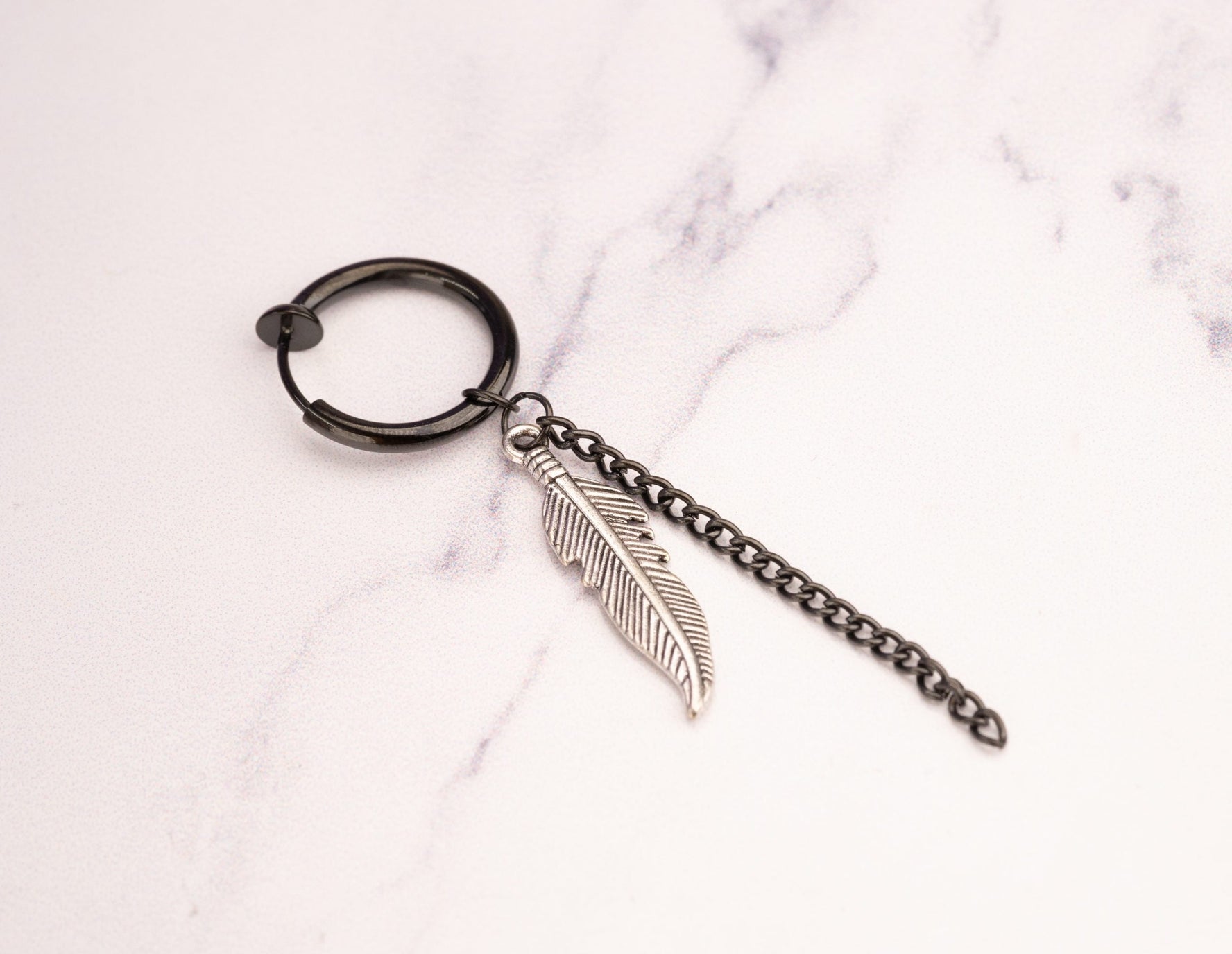 Arete Hombre Pluma A Presión Ref: F108