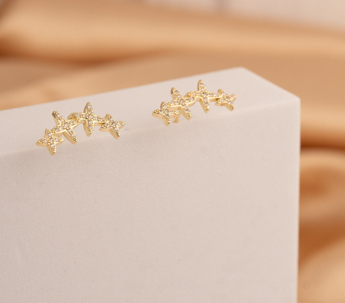 Aretes Arco Estrellas Dorados Ref: B984
