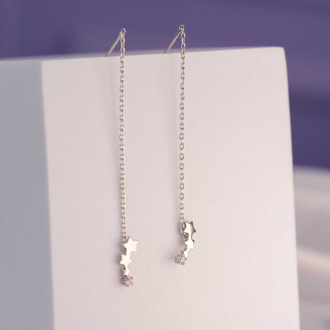 Aretes Pasantes Estrellas Plateados Ref: B1064