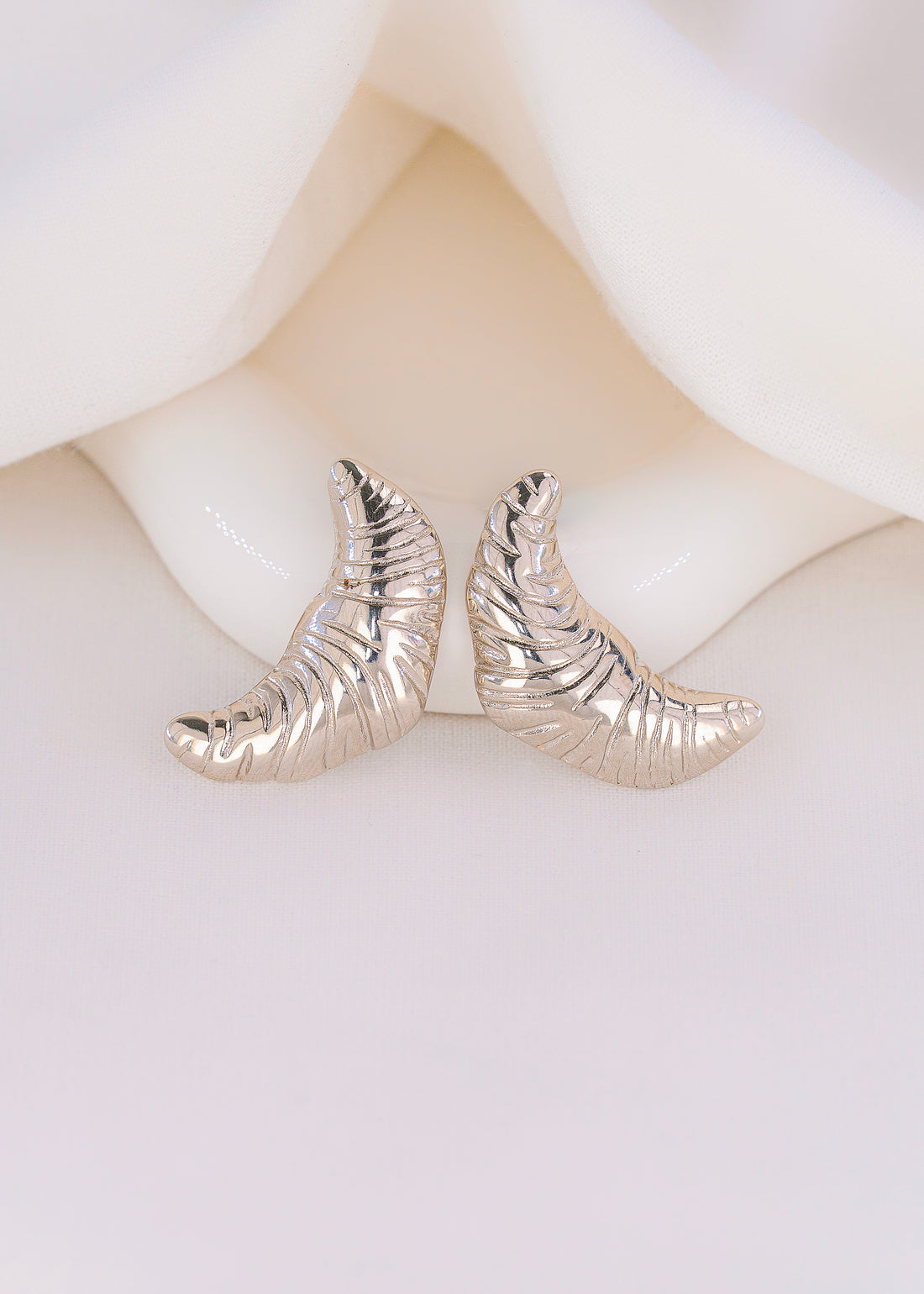 Aretes Croissant Plateados