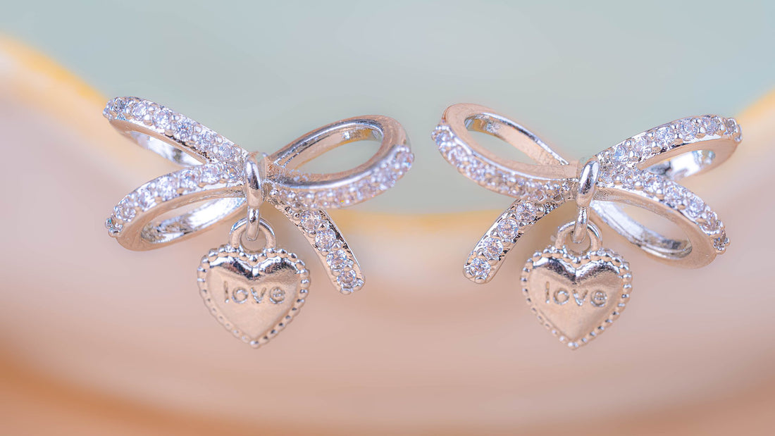 Aretes Lazo Corazón Plateado