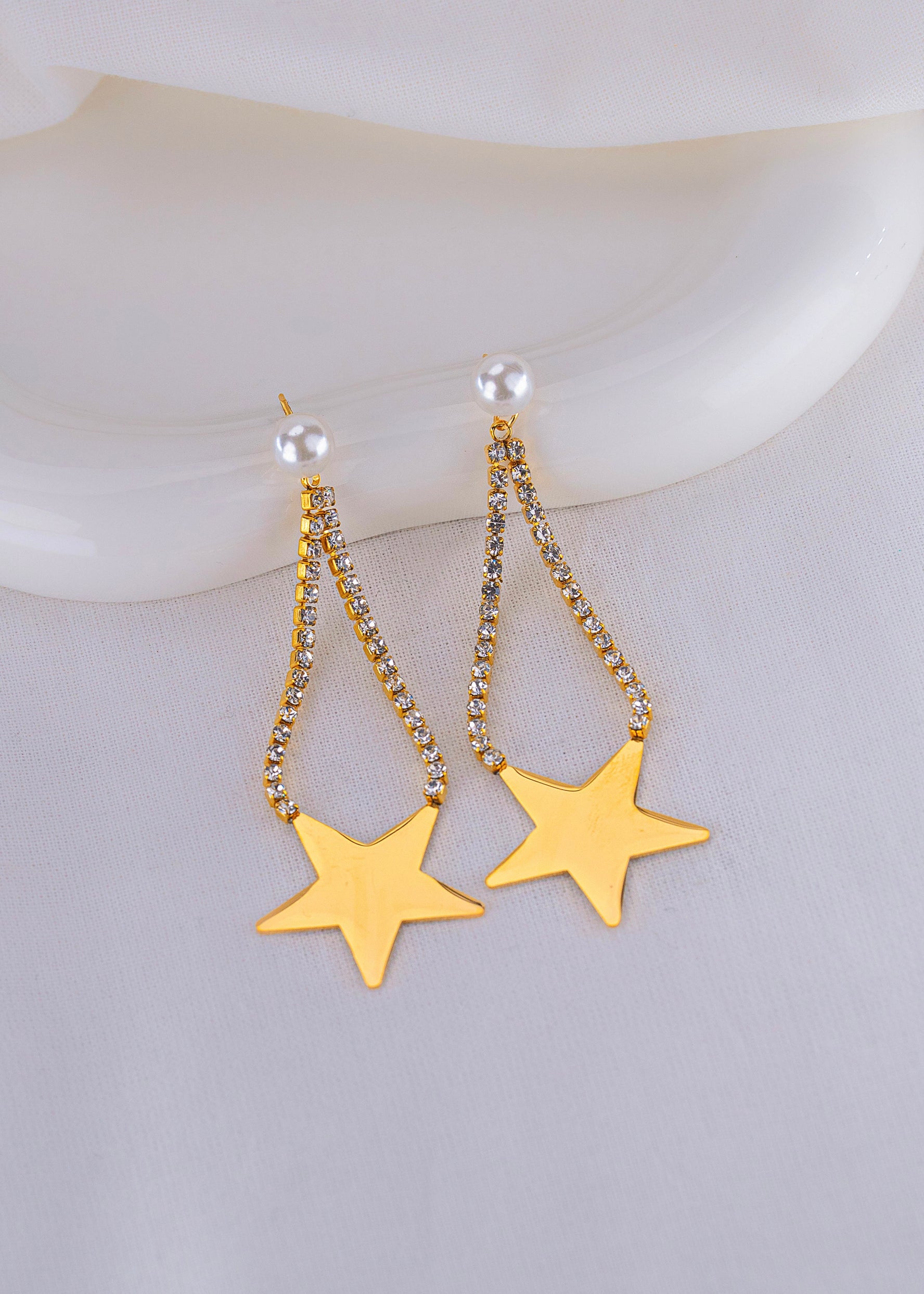 Aretes Estrellas Circones Dorados