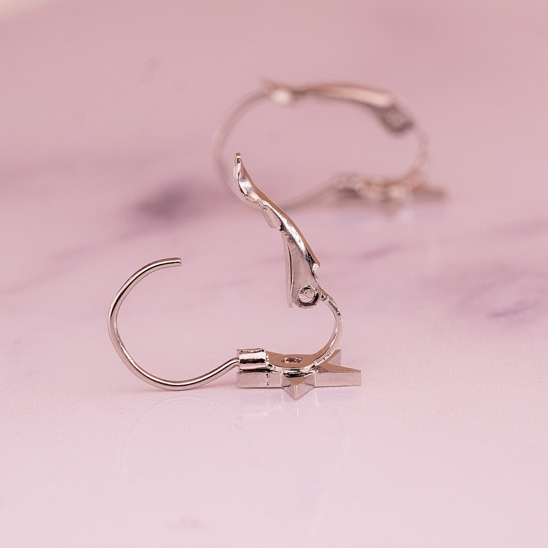 Aretes Estrellas Gancho Plateados Ref: B343